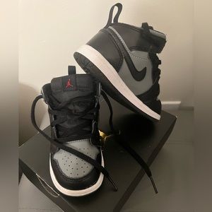 Jordan 1 mid size 8c black and gray.